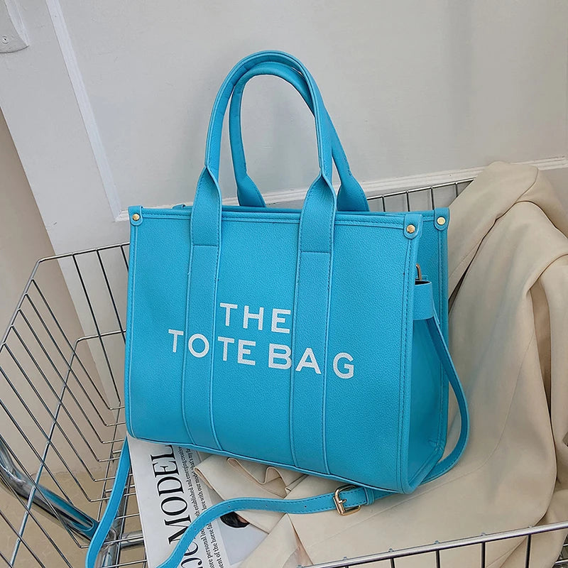 Blue designer tote bag hotsell