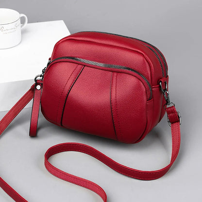 Bolso para teléfono móvil de mujer con cremallera y remaches de color sólido a la moda, bolso bandolera de cuero suave sencillo, bolso cuadrado pequeño